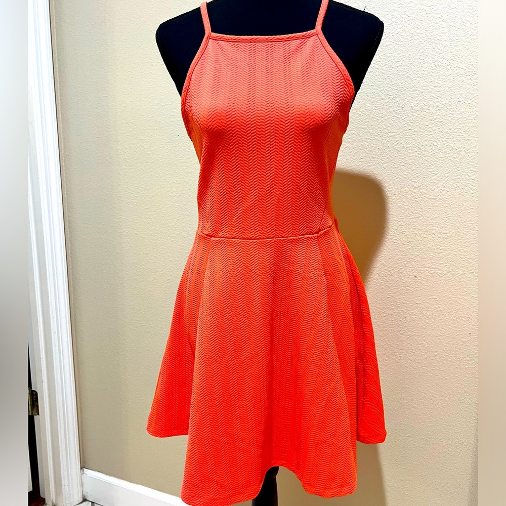 Bright coral summer flit and flare dress